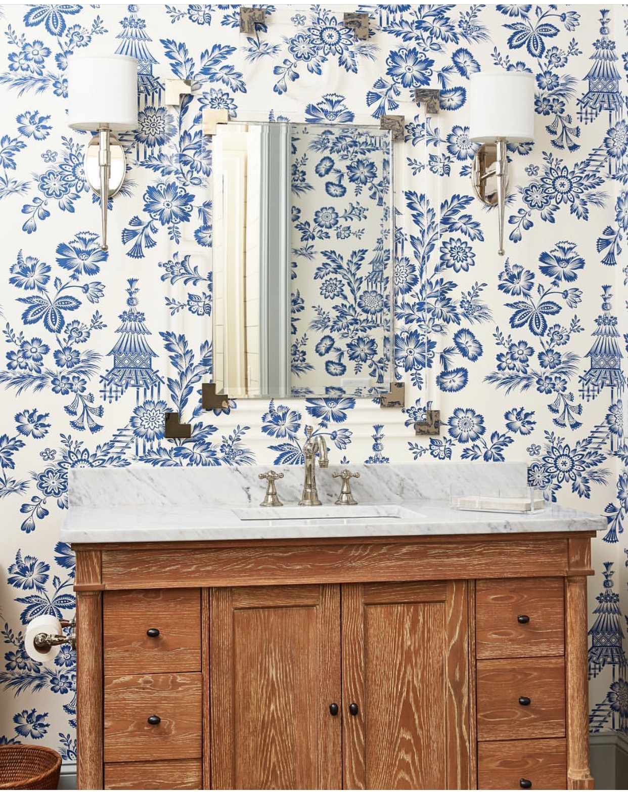 *half bath inspiration. That blue and white wall paper, lucite mirror, wood vanity and marble countertops SPEAKS to me.  