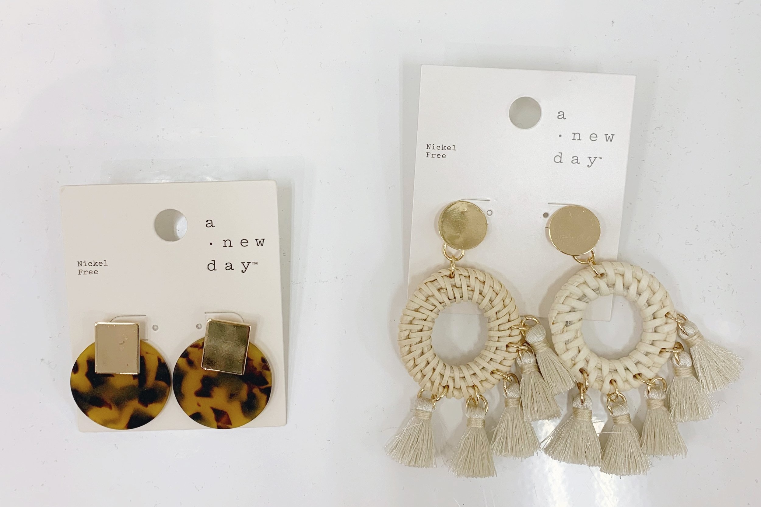 Another spring trend that is everywhere are these big raffia style tassel earrings and variations of tortoise shell. Cant get over the price of these with the tortoise being $6.00 and the tassels being $7.99. You can click here for the tortoise shel…