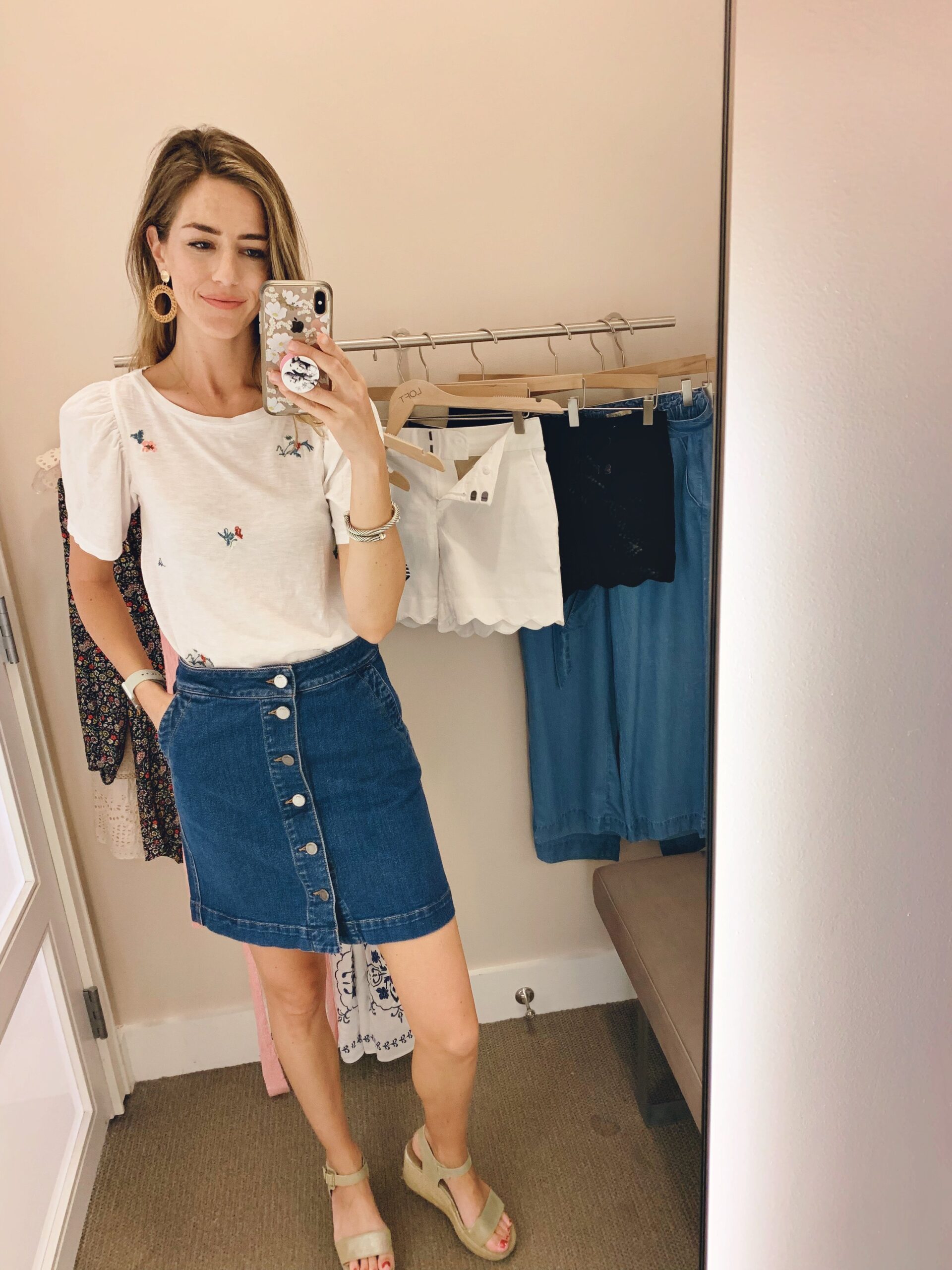 Probably one of my favorite outfits I tried on today, I am loving the revival of the jean skirt. The top with puff sleeves is casual and comfortable, but the embroidery takes a white shirt to the next level. The shirt is $13 and the skirt is $41.